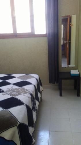 Llit o llits en una habitació de Dar new waves