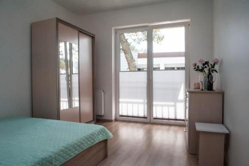 Katil atau katil-katil dalam bilik di Apartamenty Magnat