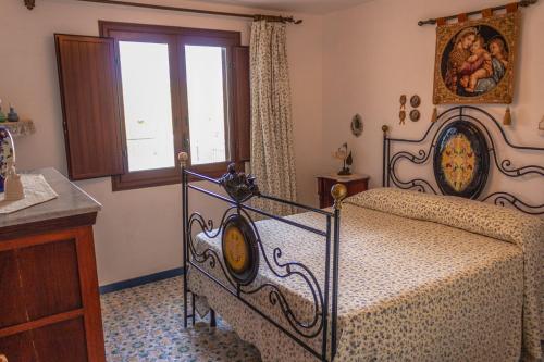Postel nebo postele na pokoji v ubytování Villa Azzurra con vista sul mare