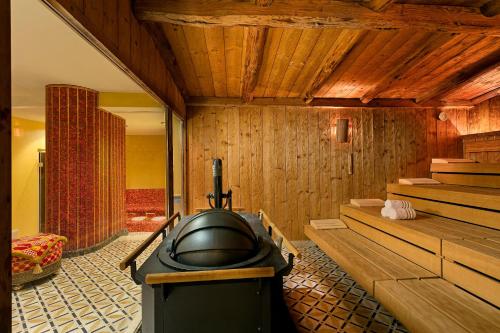 a room with a sauna with a boat in it at Titanic Mardan Palace in Lara