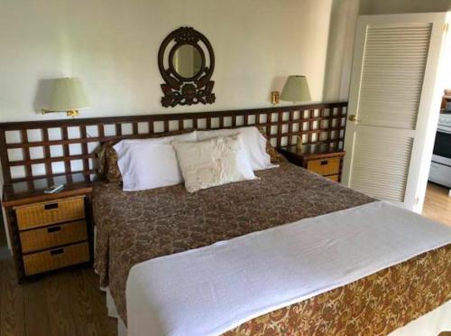 Un ou plusieurs lits dans un hébergement de l'établissement Bequia Beachfront Villas