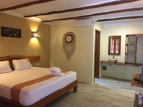 Una cama o camas en una habitación de Casa San Juan