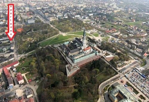 an aerial view of a large building with a tower at Apartamenty Czestochowa Eu "parking gratis" in Częstochowa