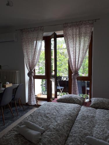 Posteľ alebo postele v izbe v ubytovaní Emily Apartment