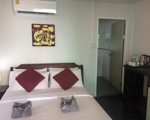 Katil atau katil-katil dalam bilik di Sunrise Villas Seaview