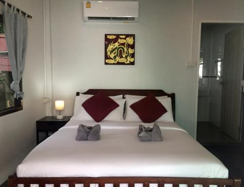 Katil atau katil-katil dalam bilik di Sunrise Villas Seaview