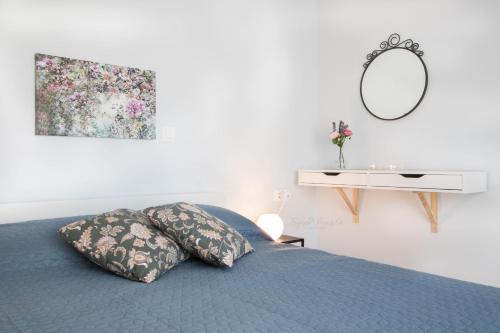 Postel nebo postele na pokoji v ubytování Aesthetic Apartments