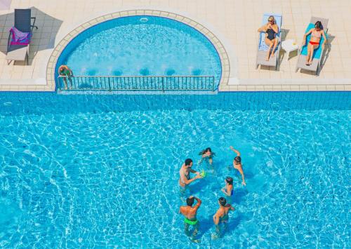 
The swimming pool at or near Hotel Taormina
