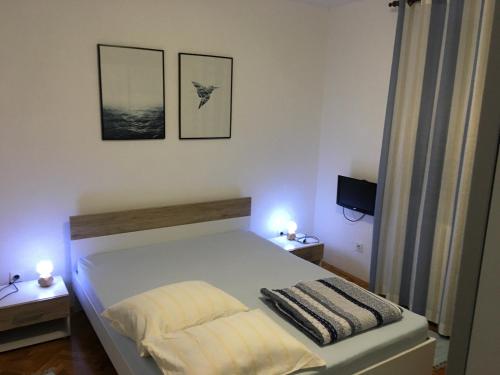 Krevet ili kreveti u jedinici u okviru objekta Nela Apartment