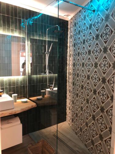 a bathroom with a shower and a sink at Dimora Labbate in Polignano a Mare