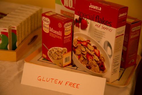 a table topped with boxes of cereal and a box of food at Station House Bed & Breakfast in Ennistymon