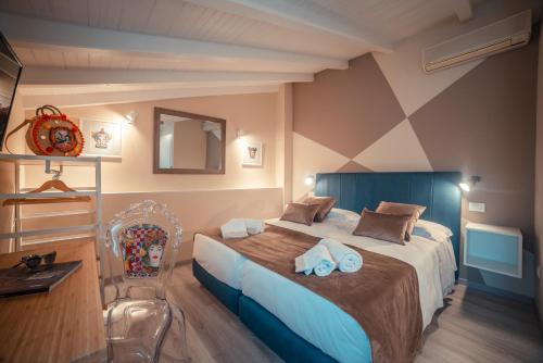 Кровать или кровати в номере A'Coffa - Rooms&Breakfast