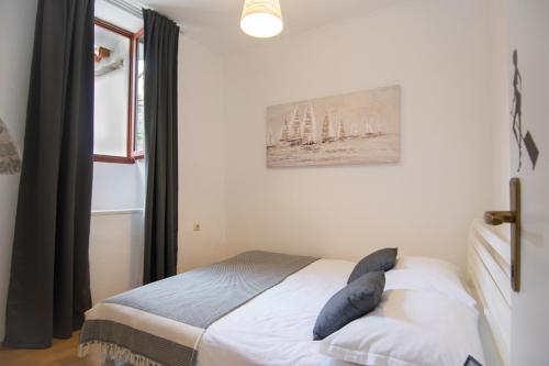 Ein Bett oder Betten in einem Zimmer der Unterkunft Studio Terrace Borgoforte