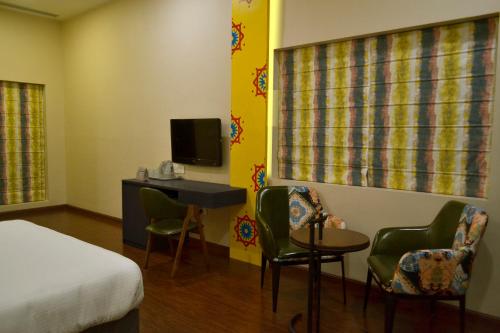 Μια τηλεόραση ή/και κέντρο ψυχαγωγίας στο Hotel Asansol International