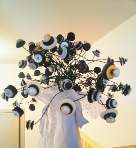 a vase with a bunch of music instruments on a wall at Casa Zebrusius - Zebrusius's App in Valfurva