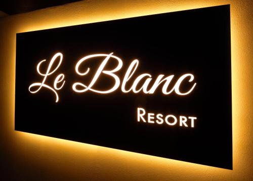 a neon sign that says is blanca resort at Le Blanc Nest Santorini - Family / Couples Luxury House in Mesaria