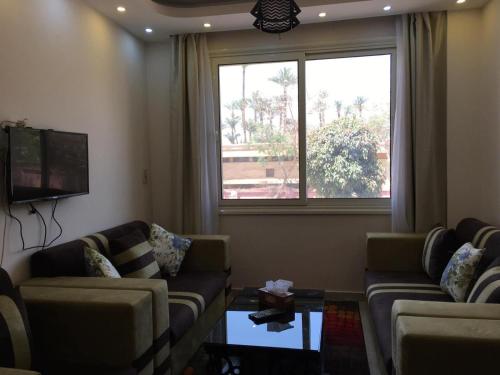 Et opholdsområde på Apartment in Luxor city center-Nil