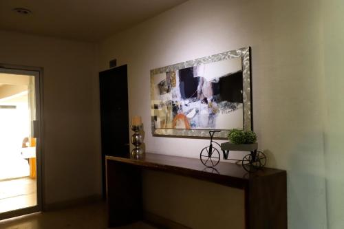 TV a/nebo společenská místnost v ubytování Homesuites Rotarismo