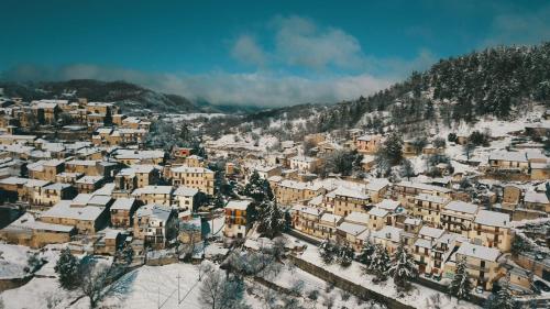 an aerial view of a city covered in snow at B&B Ad un passo dal Cielo in Pietrasecca