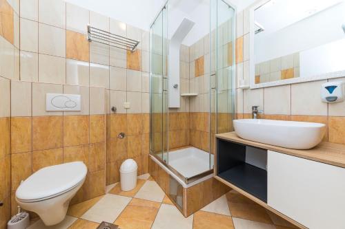 Koupelna v ubytování Apartments Gavran