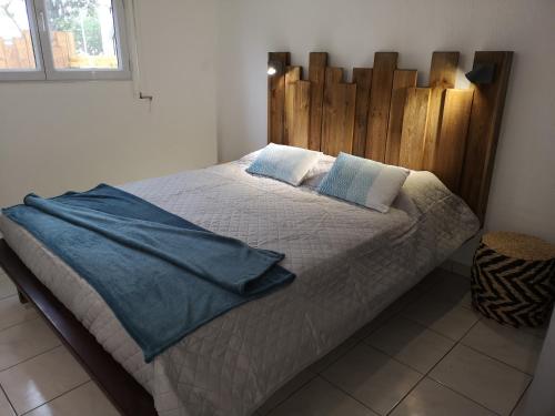 Ένα ή περισσότερα κρεβάτια σε δωμάτιο στο Le PLAYA LODGE