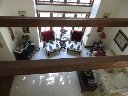 an overhead view of a living room with chairs and tables at Cedar Gables Bed & Breakfast in Niagara on the Lake