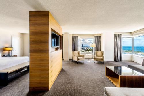 a hotel room with a bed and a television at Hyatt Regency McCormick Place Chicago in Chicago