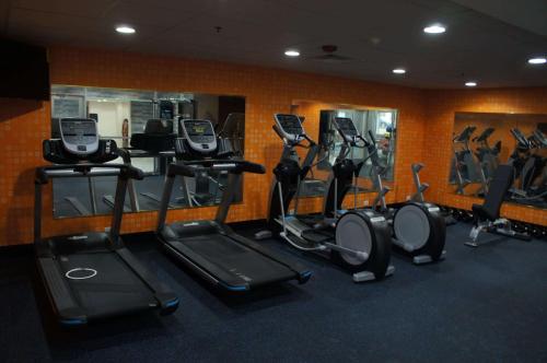 a gym with a bunch of exercise bikes in a room at La Quinta by Wyndham Branson in Branson