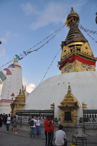 a group of people standing in front of a building at STUPA VIEW INN in Kathmandu