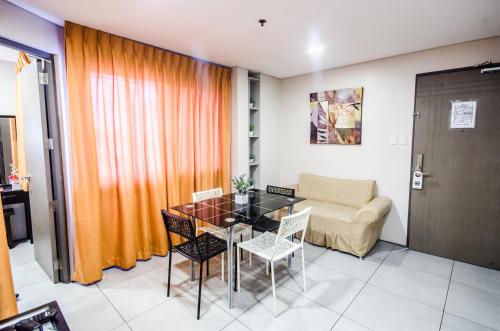 Zona de estar de Jade Hotel and Suites