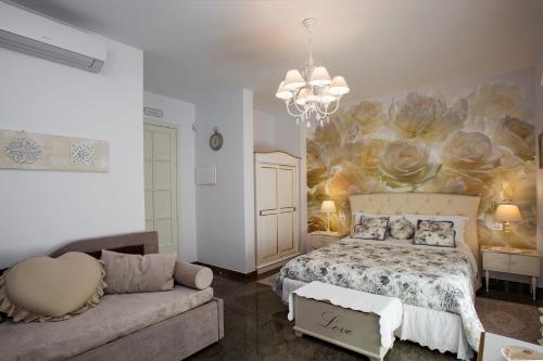 Ένα ή περισσότερα κρεβάτια σε δωμάτιο στο B&B Blanc Maison Etna Relais & Charme