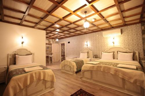 Celsus Boutique Hotelにあるベッド