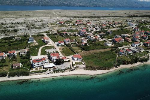 an aerial view of a town on the beach at Apartments Anka in Rtina