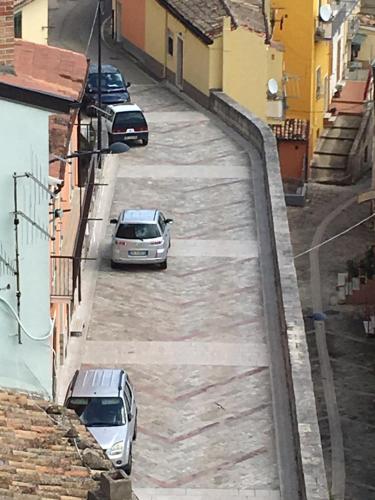 a group of cars parked on a street at La Vista in Calitri