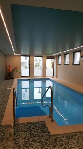 Swimmingpoolen hos eller tæt på Domitys - Les Robes d'Airain