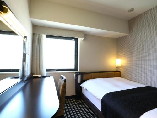 Cama o camas de una habitación en APA Hotel Shimbashi Toranomon