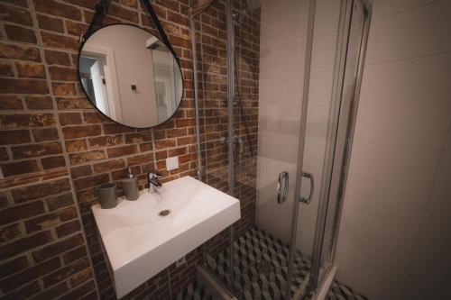 Ένα μπάνιο στο Kostjukowski Apartments Lychakivska 70a