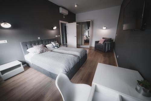 Ένα ή περισσότερα κρεβάτια σε δωμάτιο στο Kostjukowski Apartments Lychakivska 70a
