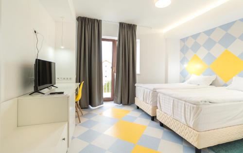 Ένα ή περισσότερα κρεβάτια σε δωμάτιο στο Horeum Boutique Hotel