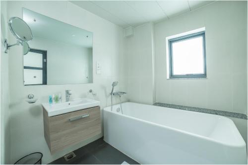 Ένα μπάνιο στο Belgian Hotel Pvt. Ltd