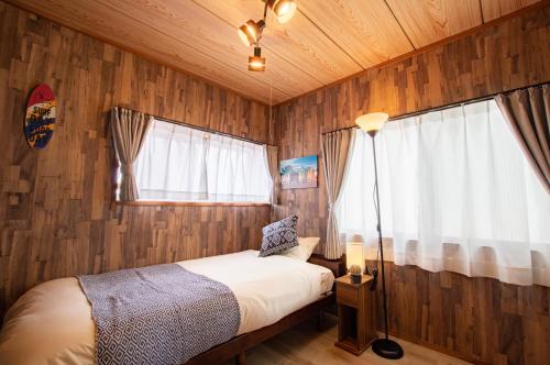 Postel nebo postele na pokoji v ubytování Villent Kujukuri Ocean 1