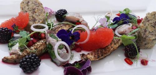 a plate of food with vegetables and fruit on it at Grand Hotel Swanage in Swanage