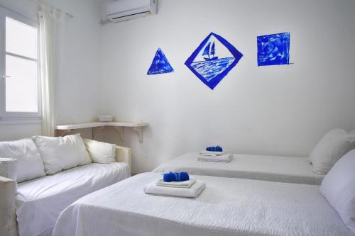 Ένα ή περισσότερα κρεβάτια σε δωμάτιο στο Villa Spiaggia Bianca