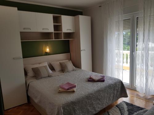 Ліжко або ліжка в номері Rooms Neda