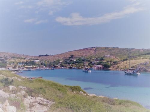 a group of boats in a large body of water at Arki Island-Katsavidis in Arkoi