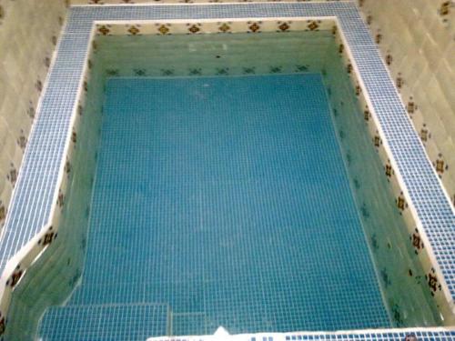 Bazén v ubytování VILLA COLONIAL nebo v jeho okolí