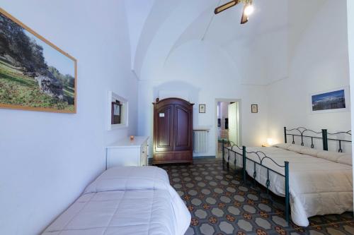 Una cama o camas en una habitación de Casa vacanza La Stradella