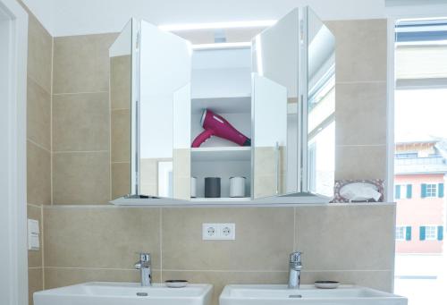 Phòng tắm tại Ferienwohnung Narzisse - City Appartement im Kurpark Bad Aussee