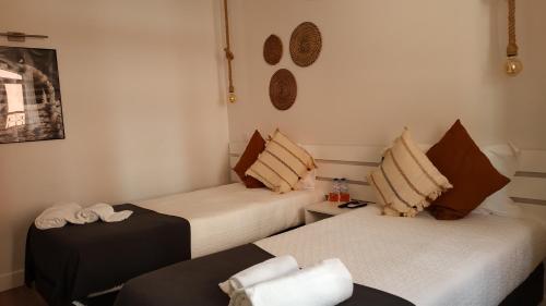Postel nebo postele na pokoji v ubytování Bartholomeu GuestHouse 2
