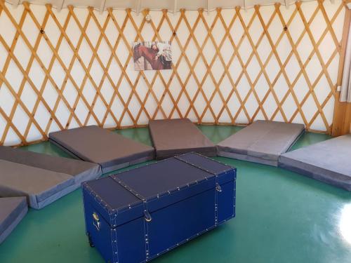 a room with four beds in a yurt at Village on the Cliff in Giv'at Yo'av
